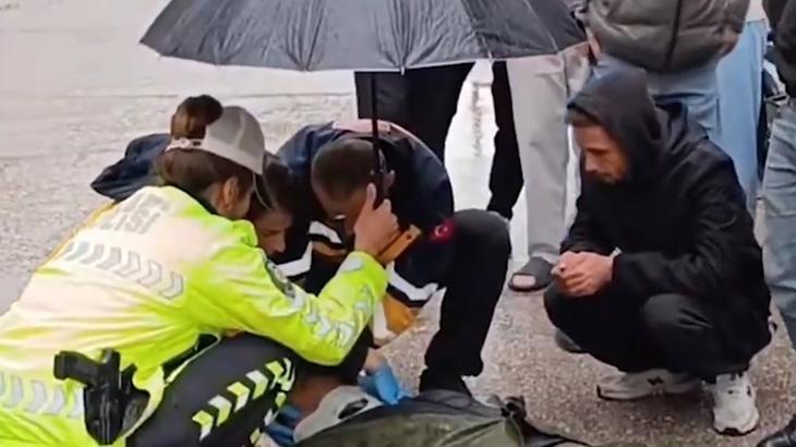 İnegöl’de içleri ısıtan anlar! İçişleri Bakanı Çiftçi’den yaralı gence şemsiye tutan trafik polisi Şerife Nur Can’a teşekkür